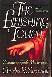 brown book cover with man's hand symbolizing God for daily devotional